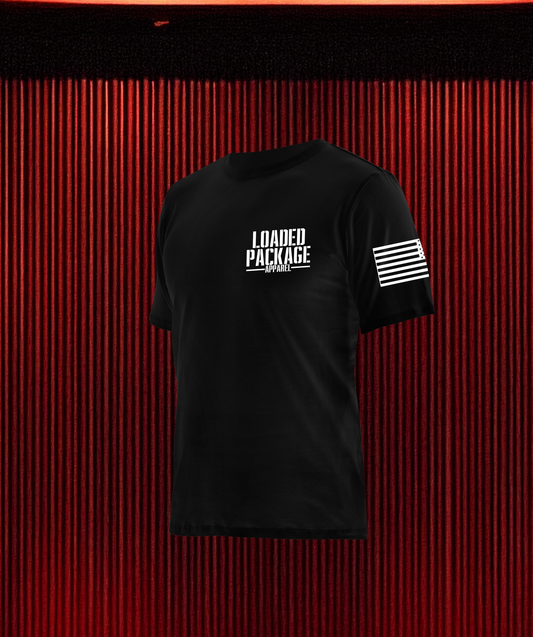 Front of Loaded Package tactical apparel with logo on chest and U.S. flag on sleeve — patriotic gear for veterans, military, and 2A supporters.