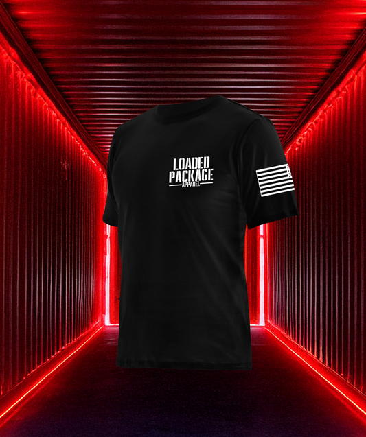 Front of Loaded Package tactical shirt with chest logo and American flag on sleeve — rugged patriotic apparel for military, LEO, and 2A advocates.