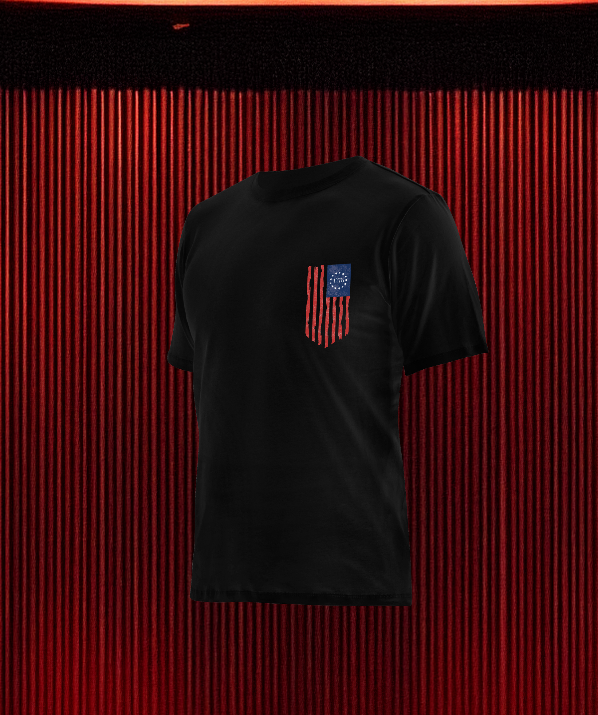 Front of Loaded Package tactical apparel with logo on chest and U.S. flag on sleeve — patriotic gear for veterans, military, and 2A supporters.