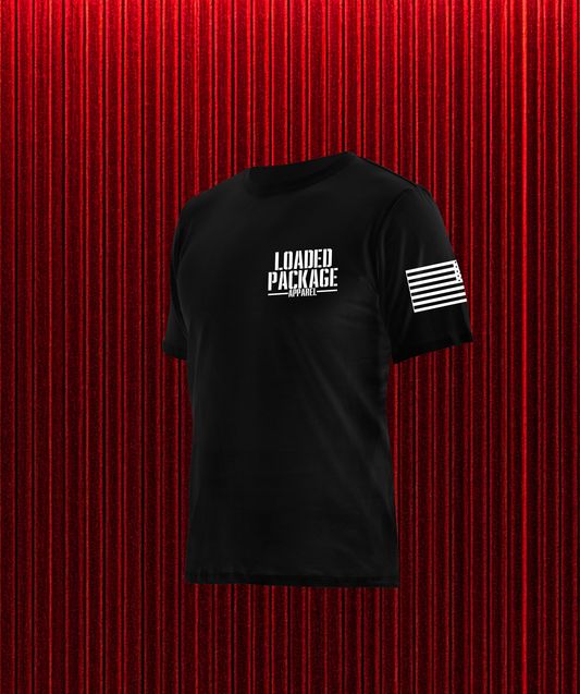 Front of Loaded Package tactical tee with chest logo and U.S. flag on left sleeve — military-style patriotic clothing.