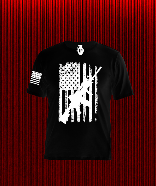 Back of Loaded Package tactical shirt featuring distressed American flag with diagonal M4A1 rifle — patriotic, pro-2A apparel for military and gun rights supporters