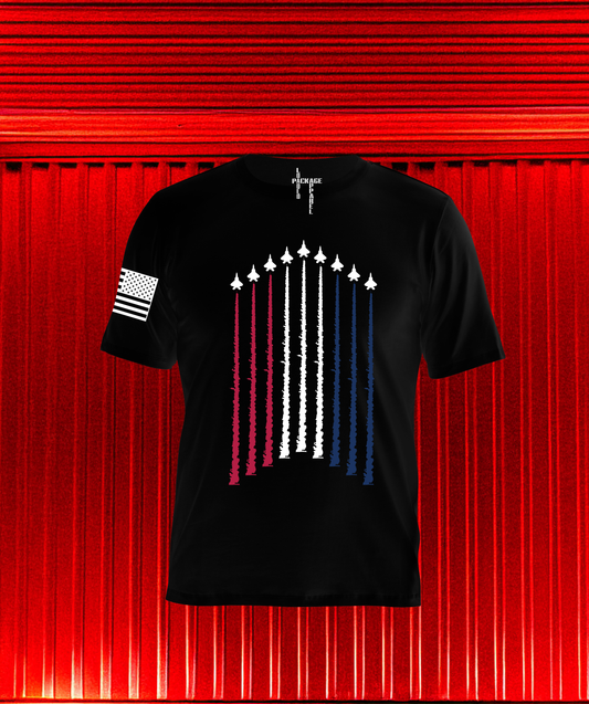 Back of Loaded Package tactical shirt featuring military jets ascending with red, white, and blue contrails — patriotic aviation design honoring American strength and air power.